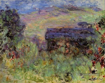  Vue Tableaux - La maison vue à travers les roses Claude Monet